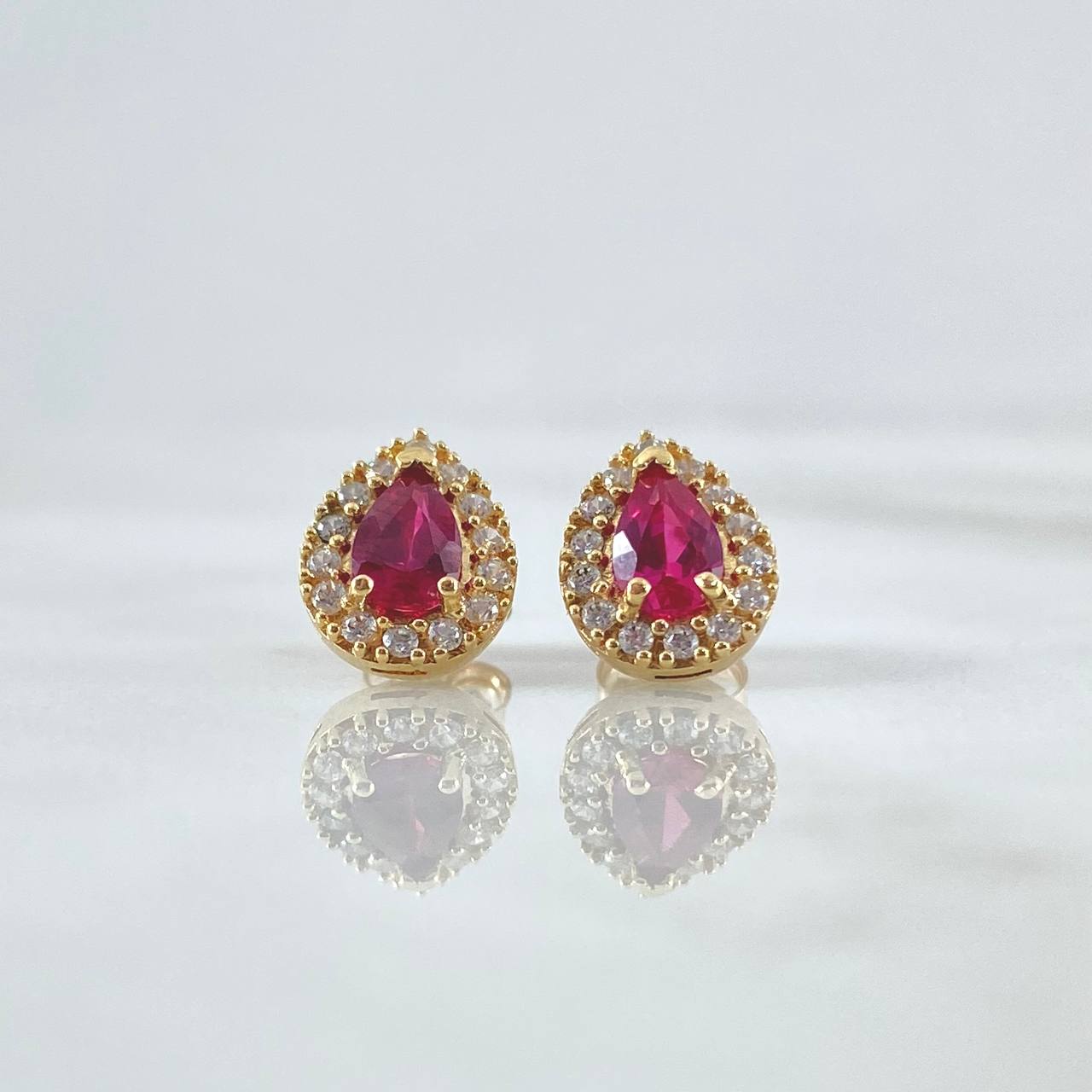 Topos Gota 2.65gr / 1cm / Circones Blancos - Fucsia Oro Amarillo 18K Topos Gota 2.65gr / 1cm / Circones Blancos - Fucsia Oro Amarillo 18K