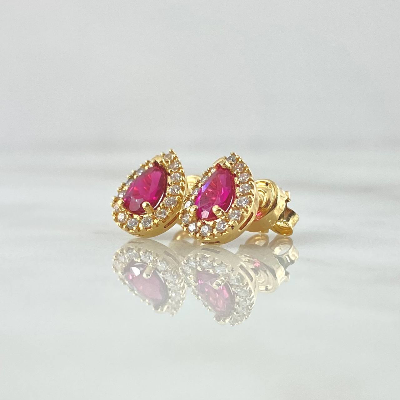 Topos Gota 2.65gr / 1cm / Circones Blancos - Fucsia Oro Amarillo 18K Topos Gota 2.65gr / 1cm / Circones Blancos - Fucsia Oro Amarillo 18K
