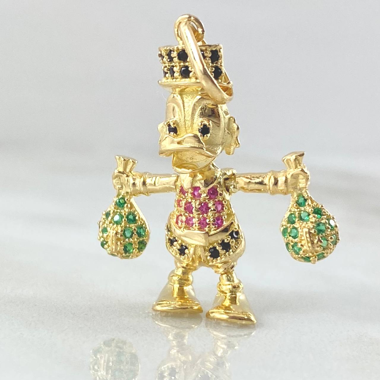 Dije Pato Bolsas Dinero 4.15gr / 3.5cm / Oro Amarillo 18K © Dije Pato Bolsas Dinero 4.15gr / 3.5cm / Oro Amarillo 18K ©