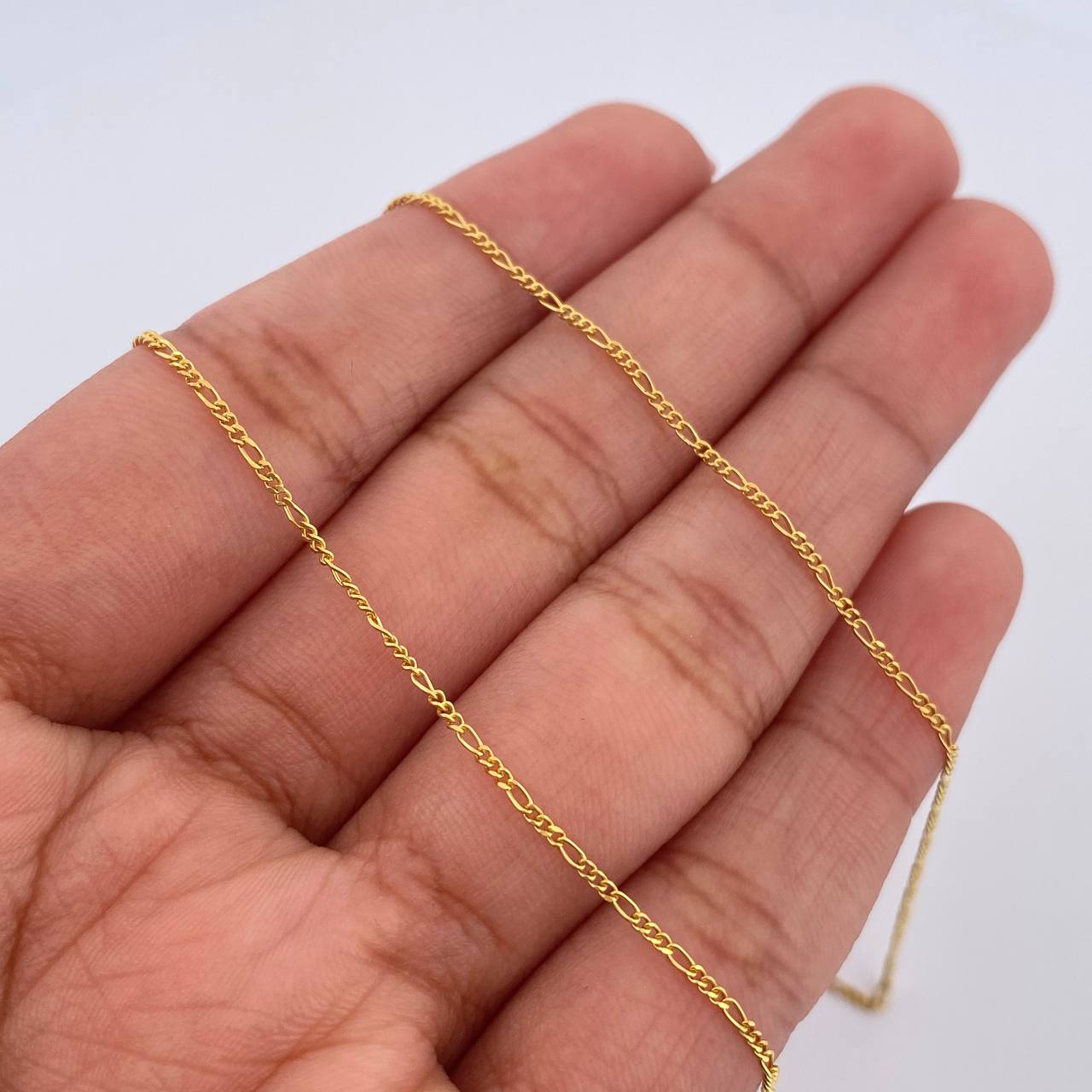 Cadena Figaro 2.25gr / 60cm / Oro Amarillo +1 18K $ Cadena Figaro 2.25gr / 60cm / Oro Amarillo +1 18K $