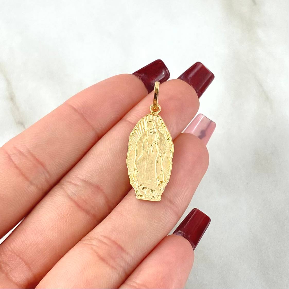 Dije Virgen Guadalupe 2gr / 3.2cm / Oro 18K © Dije Virgen Guadalupe 2gr / 3.2cm / Oro 18K ©