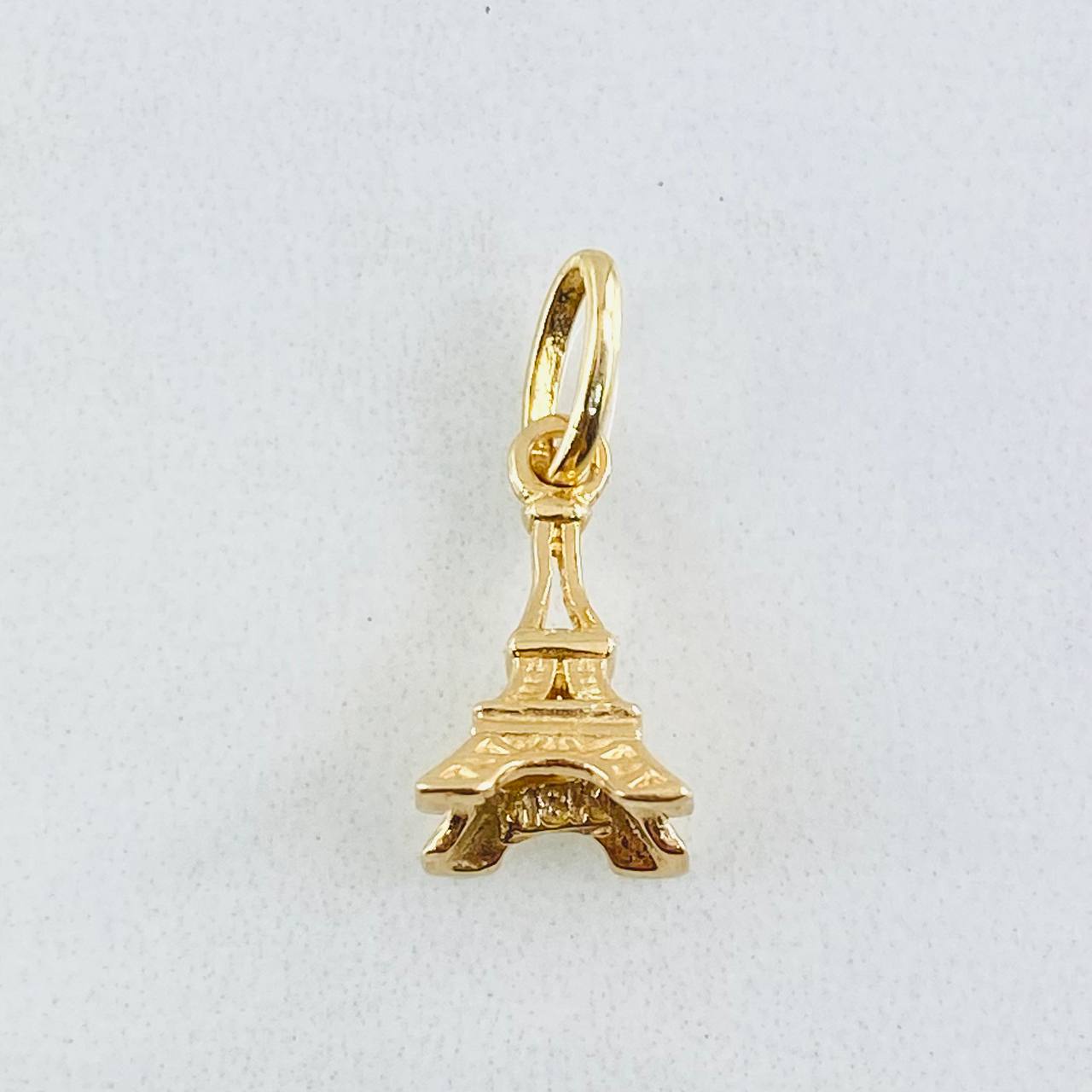 Dije Torre Eiffel 1.05gr / 1.9cm / Oro Amarillo 18K © Dije Torre Eiffel 1.05gr / 1.9cm / Oro Amarillo 18K ©