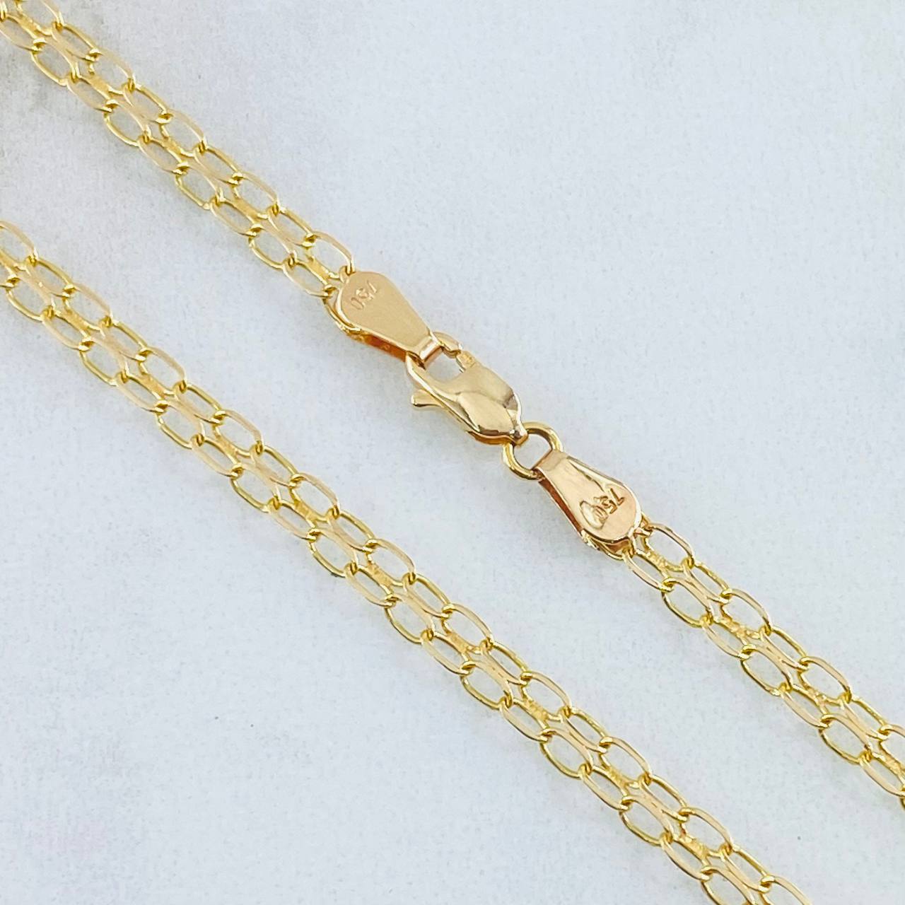 Cadena China 5.25gr / 60cm / Oro Amarillo +1 18K Cadena China 5.25gr / 60cm / Oro Amarillo +1 18K