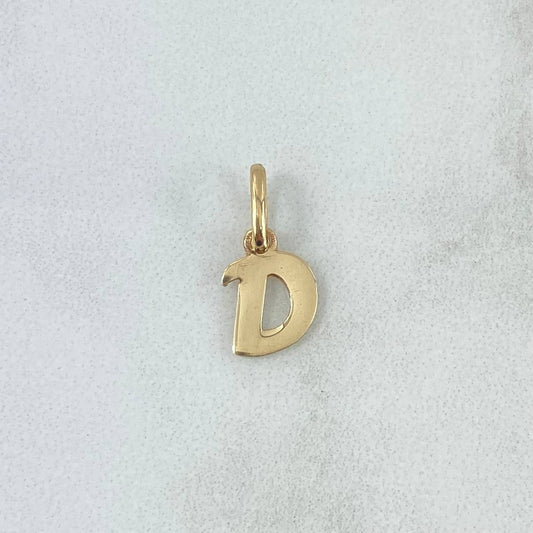 Dije Letra D Cursiva 0.5gr / 1.6cm / Oro Amarillo 18K ©