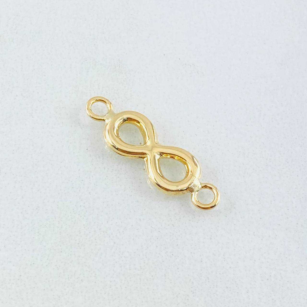 Herraje Infinito 0.65gr / 0.7cm / Oro Amarillo 18K * Herraje Infinito 0.65gr / 0.7cm / Oro Amarillo 18K *