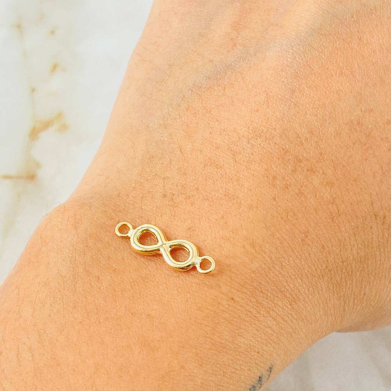 Herraje Infinito 0.65gr / 0.7cm / Oro Amarillo 18K * Herraje Infinito 0.65gr / 0.7cm / Oro Amarillo 18K *