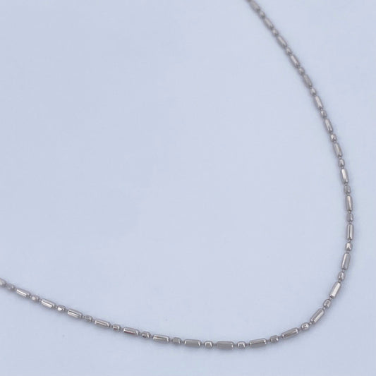Cadena Morse 1.35gr / 45.4cm / Oro Blanco +3 18K &