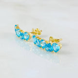 Topos Línea Corazones Celestes 2.7gr / Oro Amarillo 18K Topos Línea Corazones Celestes 2.7gr / Oro Amarillo 18K