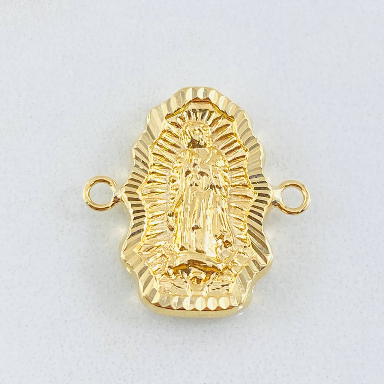 Herraje Silueta Virgen Guadalupe 1.55gr / 1.9cm / Oro Amarillo 18K © Herraje Silueta Virgen Guadalupe 1.55gr / 1.9cm / Oro Amarillo 18K ©