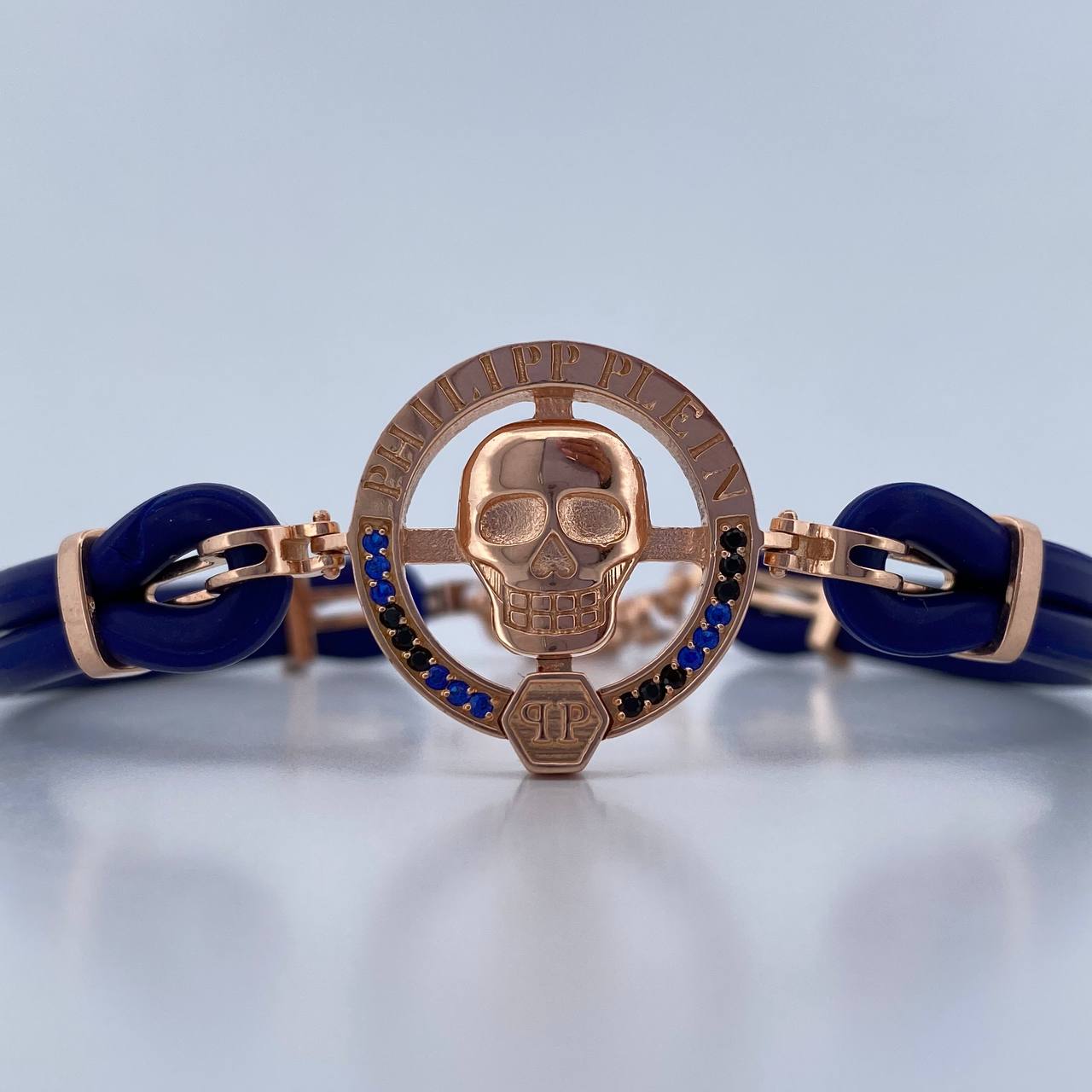 Pulso Calavera 12.9gr / 21.2cm / Cauchos Azules Circones Azules Negros Oro Rosa 18K & Pulso Calavera 12.9gr / 21.2cm / Cauchos Azules Circones Azules Negros Oro Rosa 18K &