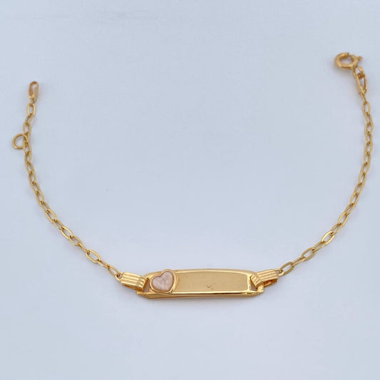 Pulso Bebe Cajon Corazon Rosado 1.5gr / 13.4cm-14.7cm / 1.8mm Placa Rectangular Curva Oro Amarillo 18K $