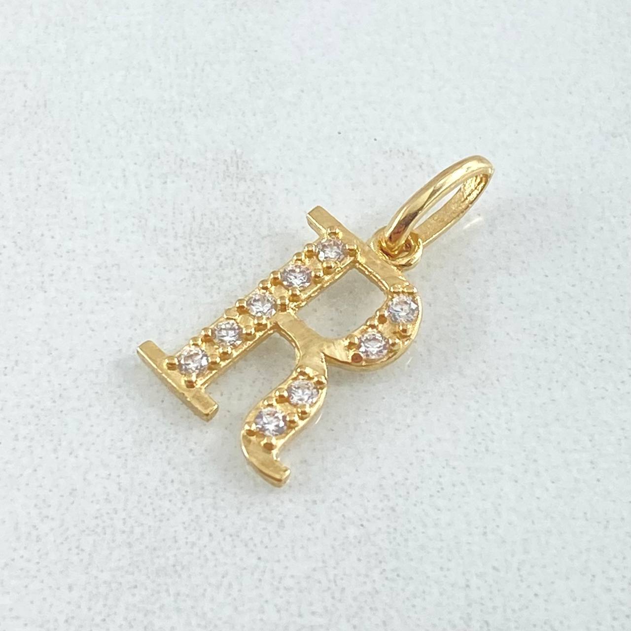 Dije Letra R Silueta 0.95gr / 2cm / Oro 18K Dije Letra R Silueta 0.95gr / 2cm / Oro 18K