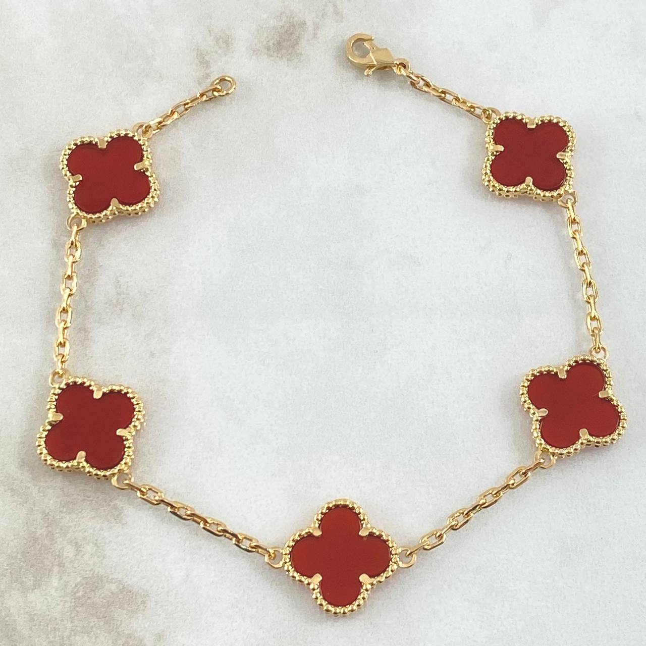 Pulso Aro Seguido Trébol VCyA Gradual 13.85gr / 22cm / 2.3mm Ambar Rojo Oro Amarillo Nac.Esp. 18K © Pulso Aro Seguido Trébol VCyA Gradual 13.85gr / 22cm / 2.3mm Ambar Rojo Oro Amarillo Nac.Esp. 18K ©