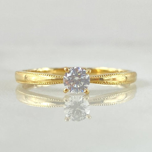 Anillo Solitario Bordeado 1.4gr / T4 3/4 / Oro 18K