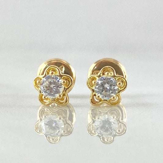 Topos Flor 0.9gr / Oro 18K ©