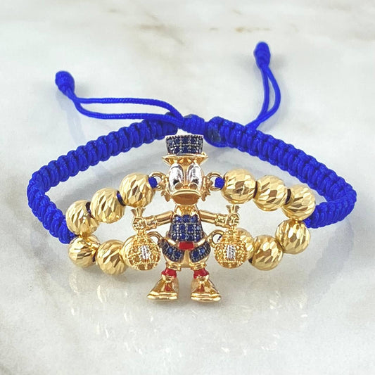 Pulsera Azul Herraje Pato Bolsas Dinero 7.5gr / Oro 18K ©