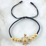 Pulsera Negra Herraje Tortuga Movil 3.65gr / Oro 18K © Pulsera Negra Herraje Tortuga Movil 3.65gr / Oro 18K ©