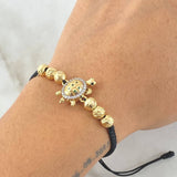 Pulsera Negra Herraje Tortuga Movil 3.65gr / Oro 18K © Pulsera Negra Herraje Tortuga Movil 3.65gr / Oro 18K ©