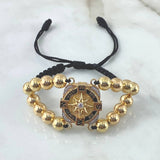 Pulsera Negra Brujula Elemental 17.1gr / 8mm Bolas Lisas 16 Und Oro Amarillo 18K © Pulsera Negra Brujula Elemental 17.1gr / 8mm Bolas Lisas 16 Und Oro Amarillo 18K ©