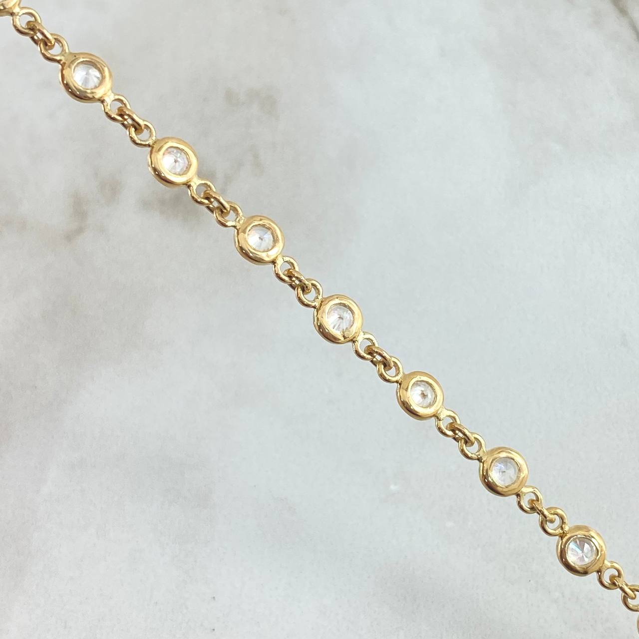 Pulso Roll-On Burbujas 5.95gr / 18cm / 4.6mm Circones Blancos Oro Amarillo 18K Pulso Roll-On Burbujas 5.95gr / 18cm / 4.6mm Circones Blancos Oro Amarillo 18K