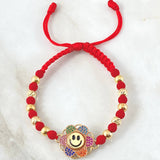 Pulsera Roja Herraje Flor Cara Feliz 5.85gr / Dos Oros Amarillo Rosa 18K © Pulsera Roja Herraje Flor Cara Feliz 5.85gr / Dos Oros Amarillo Rosa 18K ©