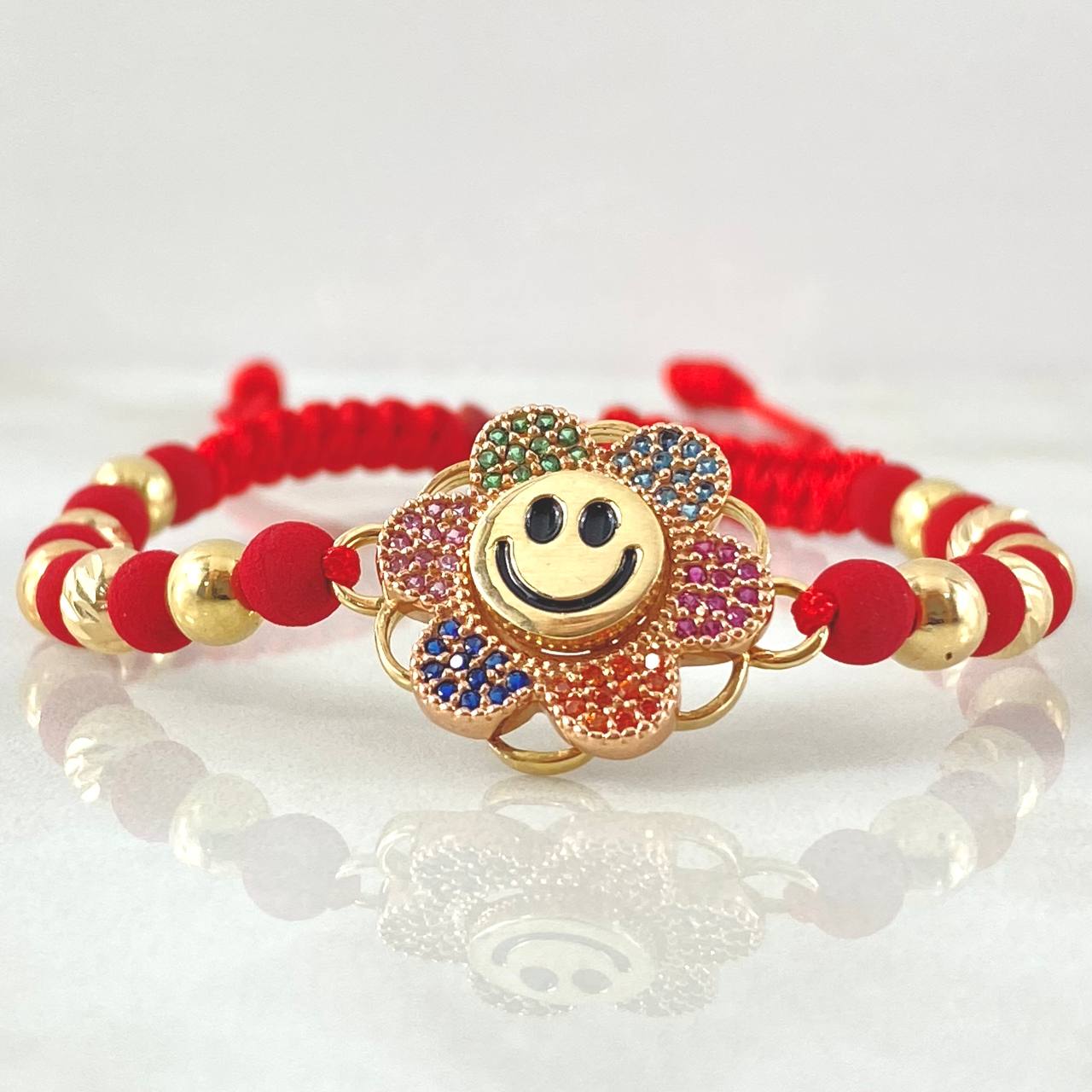 Pulsera Roja Herraje Flor Cara Feliz 5.85gr / Dos Oros Amarillo Rosa 18K © Pulsera Roja Herraje Flor Cara Feliz 5.85gr / Dos Oros Amarillo Rosa 18K ©