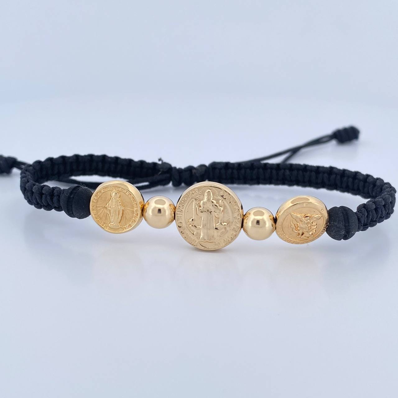 Pulsera Negra Herrajes Trio Religioso 4.35gr / 6mm Bolas Lisas Troquelado Oro Amarillo 18K & Pulsera Negra Herrajes Trio Religioso 4.35gr / 6mm Bolas Lisas Troquelado Oro Amarillo 18K &