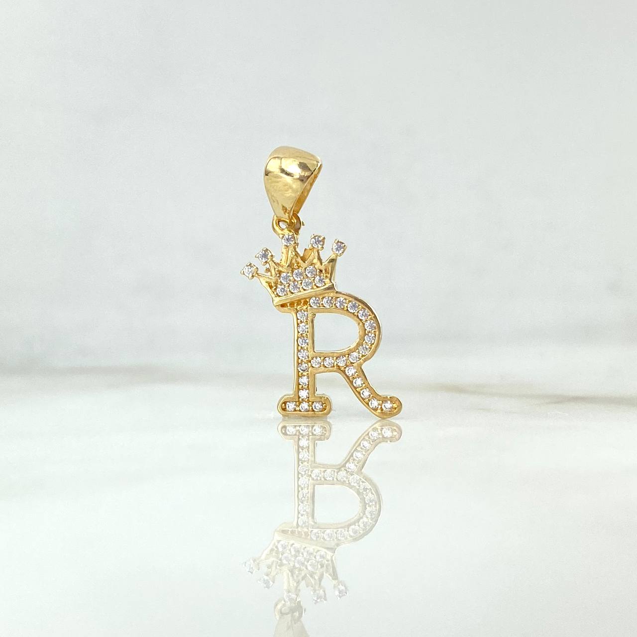 Dije Corona Letra R 1.9gr / 2.6cm / Oro Amarillo 18K © Dije Corona Letra R 1.9gr / 2.6cm / Oro Amarillo 18K ©