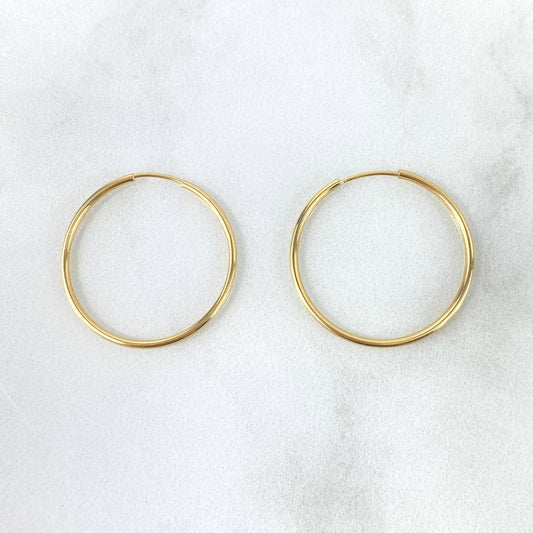 Candongas Aro Liso 1.05gr / 2.4cm / Oro Amarillo 18K ©