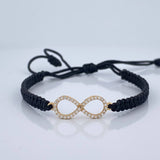 Pulsera Tejida Negra Infinito 0.85gr / Oro Amarillo 18K % Pulsera Tejida Negra Infinito 0.85gr / Oro Amarillo 18K %