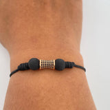 Pulsera Tejida Negra Cilindro 1.55gr / Oro Rosa 18K % Pulsera Tejida Negra Cilindro 1.55gr / Oro Rosa 18K %