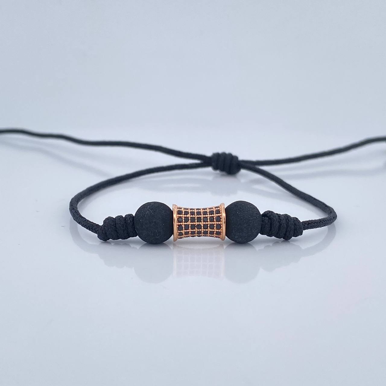 Pulsera Tejida Negra Cilindro 1.55gr / Oro Rosa 18K % Pulsera Tejida Negra Cilindro 1.55gr / Oro Rosa 18K %