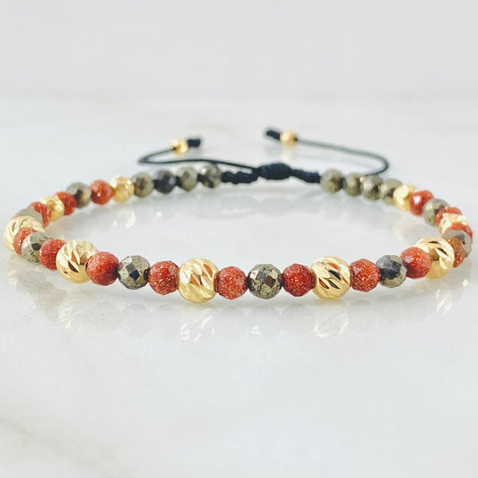 Pulsera Negra Triada Lluviosa 1.4gr / Oro Amarillo 18K (A.C)