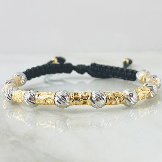 Pulsera Negra Cilindros Lunares Segmentados 3.6gr / Dos Oros Amarillo Blanco 18K *