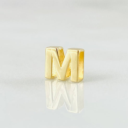 Herraje Letra M 0.45gr / 0.6cm / Oro Amarillo 18K ©