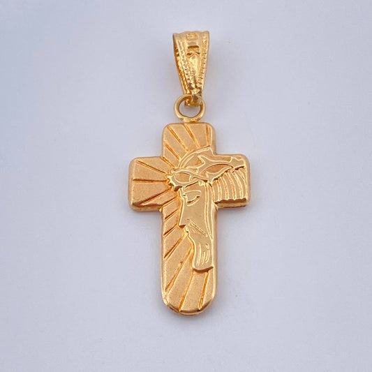 Dije Cruz Rostro Cristo 0.85gr / 2.06cm / Oro Amarillo 18K $