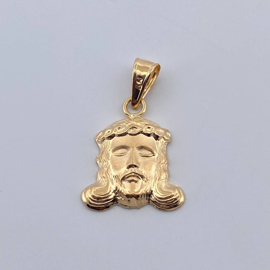 Dije Rostro Cristo 0.7gr / 2cm / Oro Amarillo 18K $
