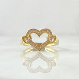 Anillo Corazones Atrapados 3.15gr / T6 1/4 / Circones Blancos Oro Amarillo 18K Anillo Corazones Atrapados 3.15gr / T6 1/4 / Circones Blancos Oro Amarillo 18K