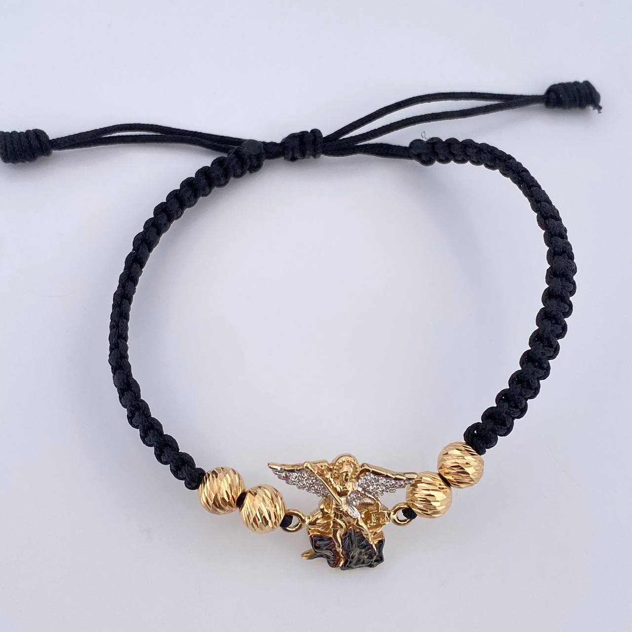Pulsera Tejida Negra San Miguel Arcángel 3.55gr / 6mm Tres Oros 18K % Pulsera Tejida Negra San Miguel Arcángel 3.55gr / 6mm Tres Oros 18K %