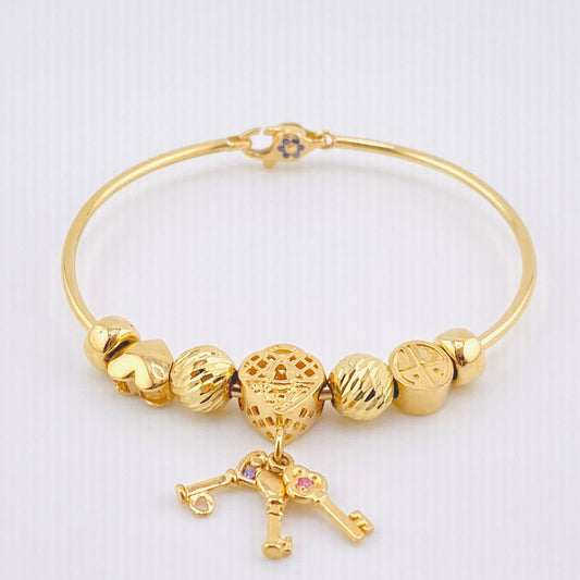 Pulso PD Llave Corazón Bolas Diamantadas 13.55gr / 17.5cm / Oro Amarillo 18K ©