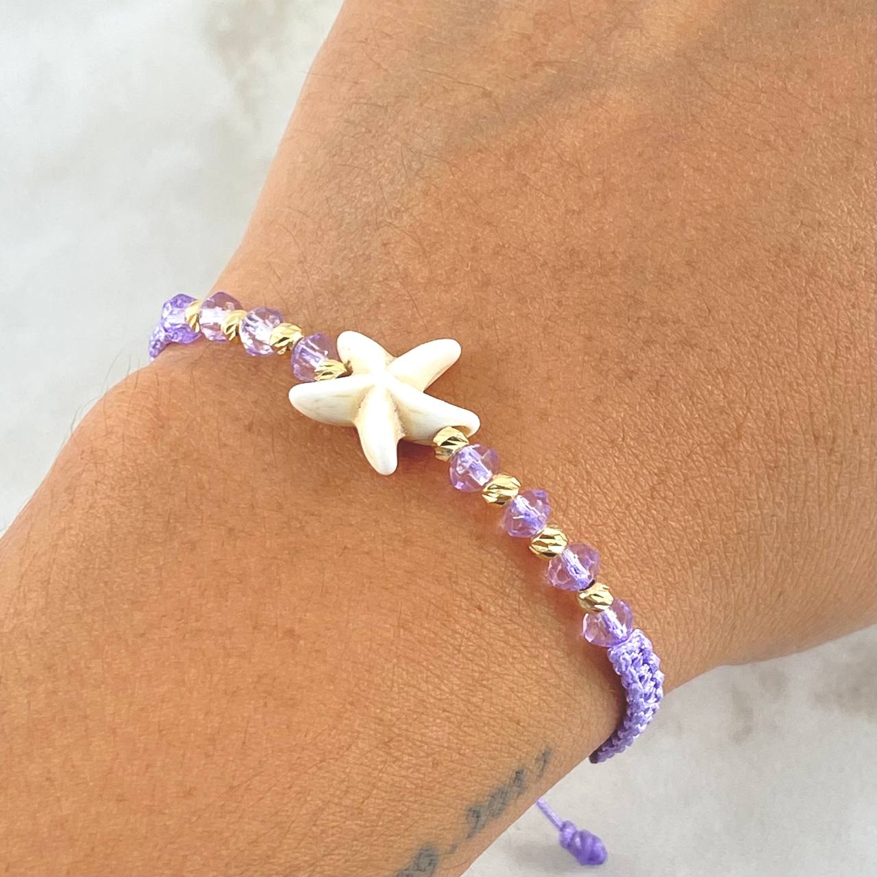 Pulsera Lila Estrella De Mar 3mm Bolas Diamantadas 8und Oro Amarillo 18K (A.C) Pulsera Lila Estrella De Mar 3mm Bolas Diamantadas 8und Oro Amarillo 18K (A.C)