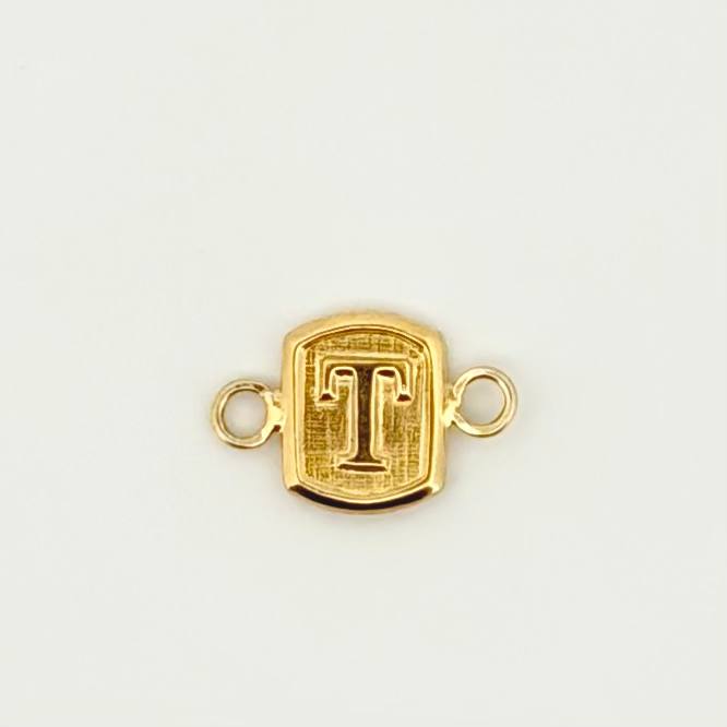 Herraje Letra T 0.3gr / 1.2cm / Oro Amarillo 18K © Herraje Letra T 0.3gr / 1.2cm / Oro Amarillo 18K ©
