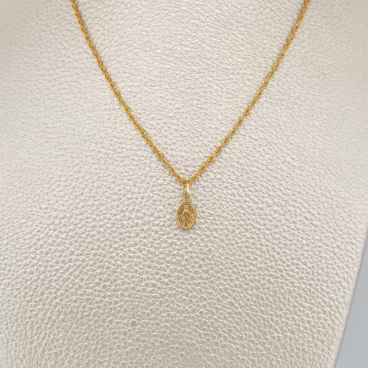 Set Cadena y Dije Lazo+ Virgen Milagrosa 1.4gr / 40.2cm / 1.44mm Oro Amarillo 18K (Oferta) $ Set Cadena y Dije Lazo+ Virgen Milagrosa 1.4gr / 40.2cm / 1.44mm Oro Amarillo 18K (Oferta) $