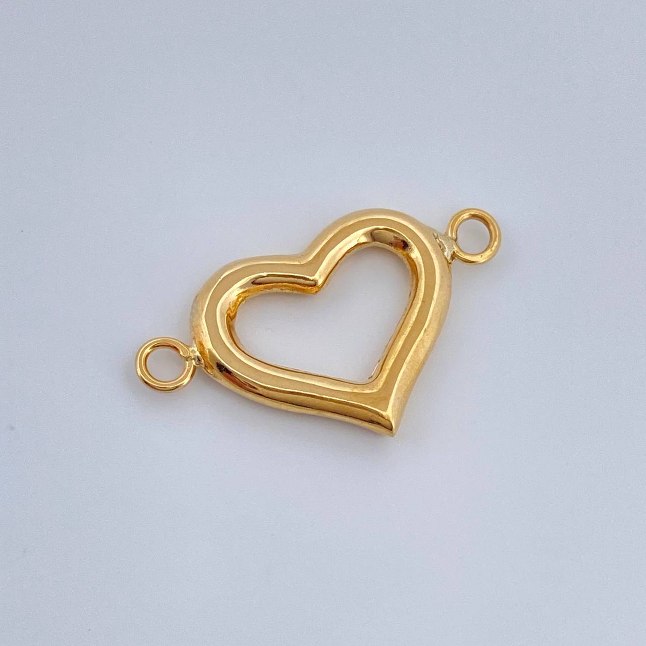 Herraje Silueta Corazon 1.2gr / 1.5cm / Oro Amarillo 18K % Herraje Silueta Corazon 1.2gr / 1.5cm / Oro Amarillo 18K %