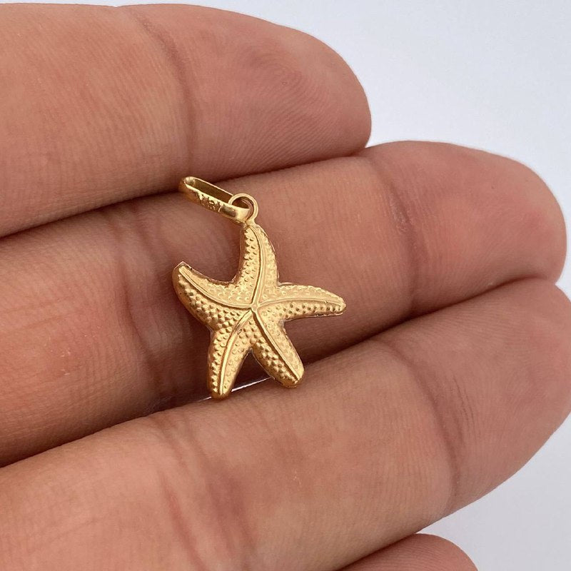 Dije Estrella De Mar 0.9gr / 2.5cm / Oro Amarillo 18K &