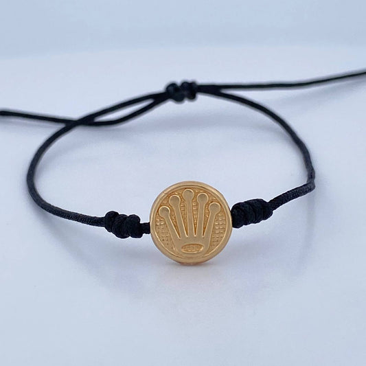 Pulsera Tejida Negra Corona Rx 0.55gr / Oro Amarillo 18K $