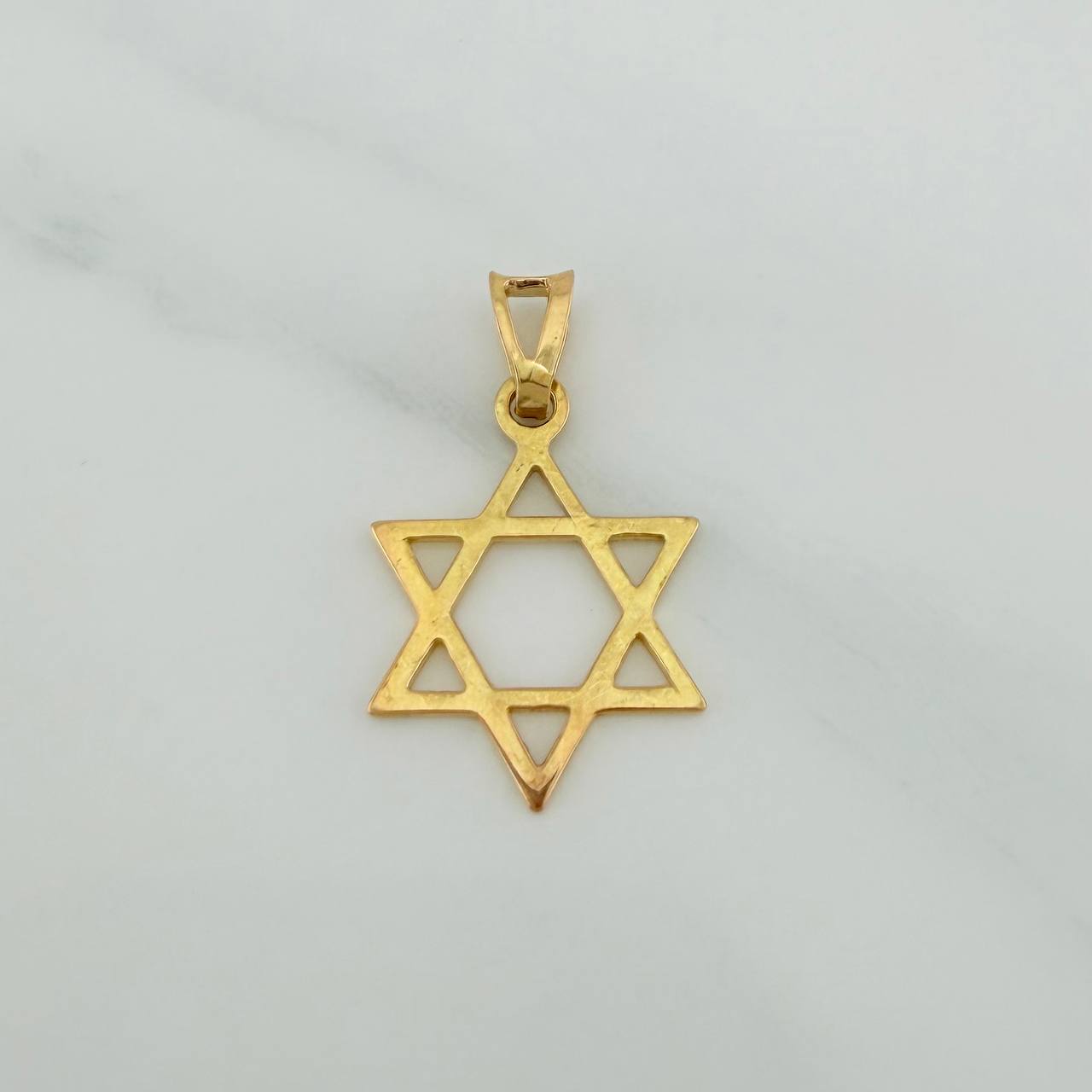 Dije Silueta Estrella 1.3gr / 2.4cm / Oro Amarillo 18K %