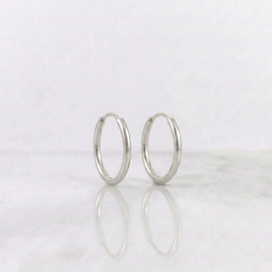 Candongas Aro Liso 0.55gr / 1.3cm / Oro Blanco 18K