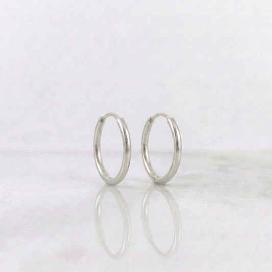 Candongas Aro Liso 0.55gr / 1.3cm / Oro Blanco 18K