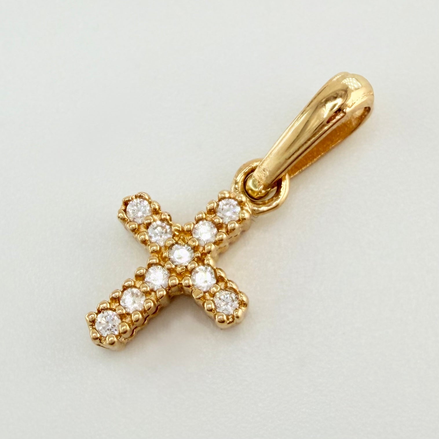 Dije Cruz Doble Faz 0.95gr / 1.9cm / Oro Amarillo 18K *